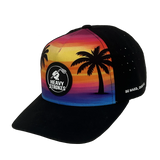 Angled view of the sunset gradient palm tree golf hat with embroidered Heavy Strokes wording